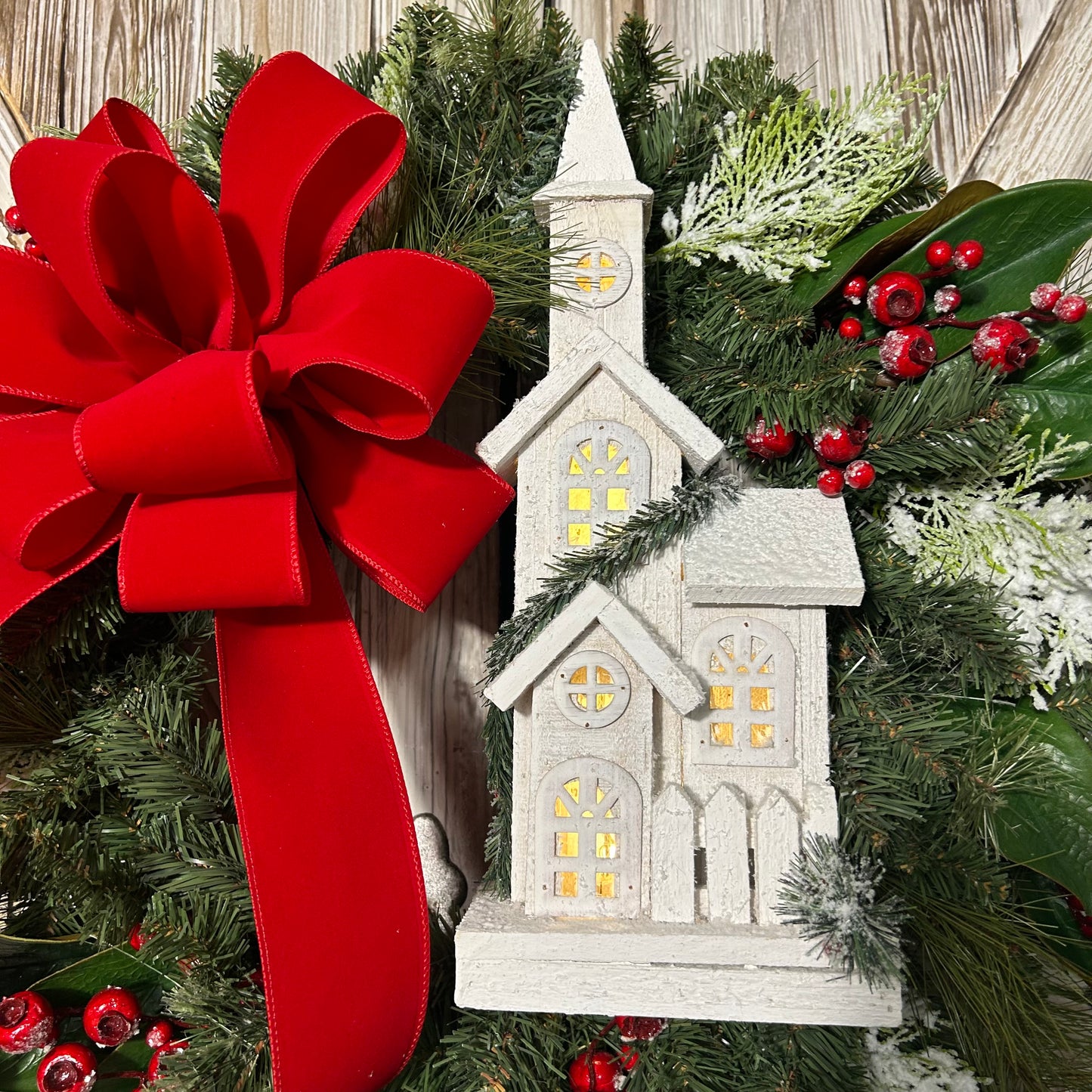 Traditional Christmas Wreath With Lighted Church