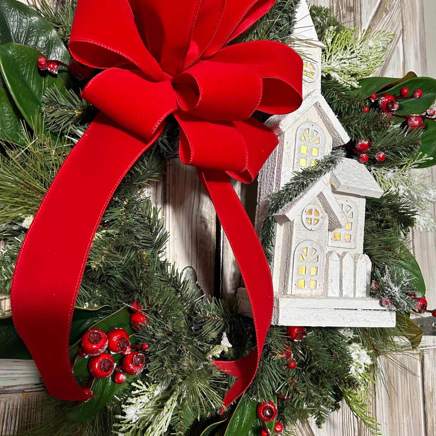 Traditional Christmas Wreath With Lighted Church