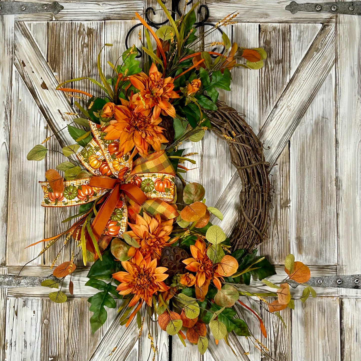 XL Fall Wreath with Orange and green faux florals, greenery and Lotus Pods